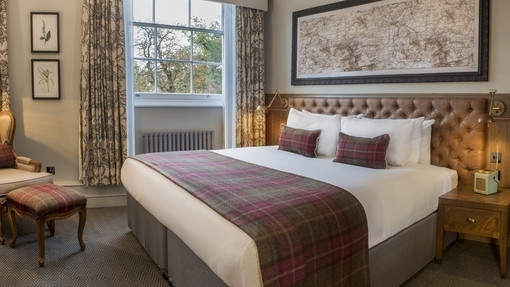 Superior bedroom in the mansion house at De Vere Wokefield Estate