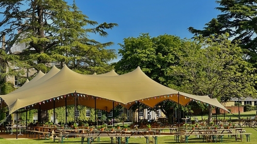 Take your event into the great outdoors under the cool shelter of the Cedar View canopy